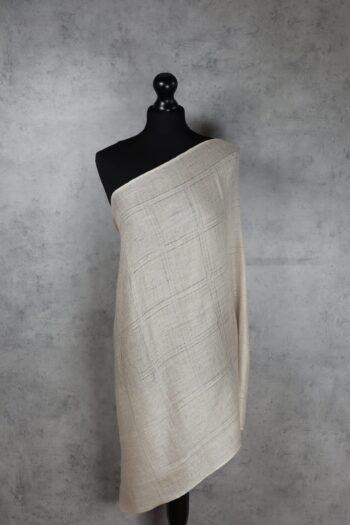 NudeNest Stole in Champagne, a luxurious nude stole crafted from a wool-silk blend, perfect for all-season layering with lightweight comfort.