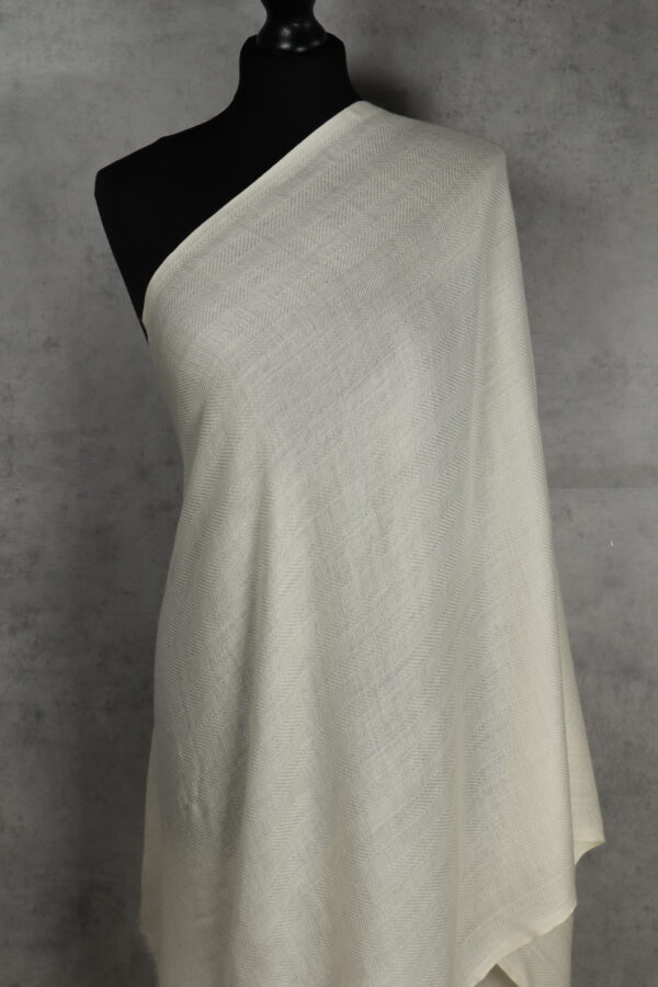 WhiteSpine Stole in cream, a breathable light stole crafted in refined herringbone for versatile styling.