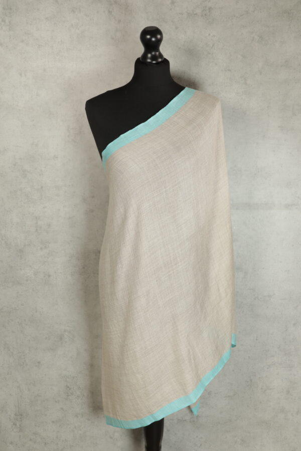 Silk Line Mirage Stole in baby blue, a long striped scarf with earthy stripes & silk-like sheen.