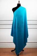 Bare Weave Shawls in sky, a wool silk shawl with plain weave design and a subtle sheen for elegant layering.