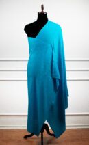 Bare Weave Shawls in sky, a wool silk shawl with plain weave design and a subtle sheen for elegant layering.
