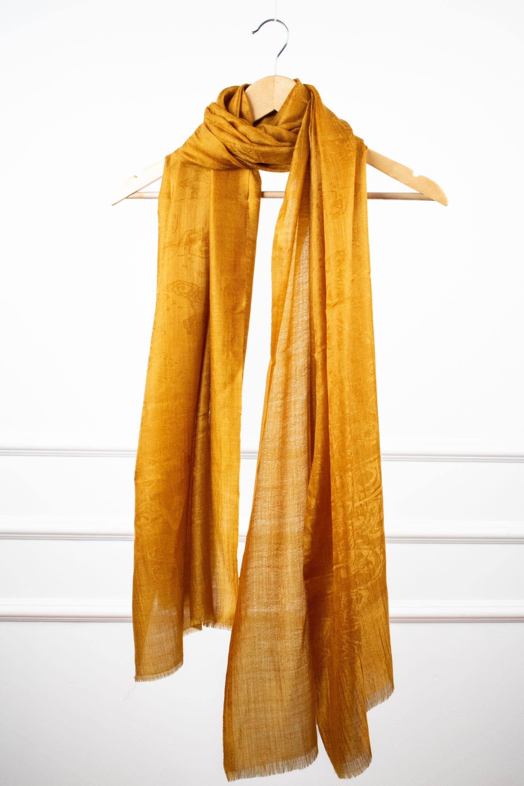 Jacquard Veil Stole in gold – soft wool-silk jacquard stole featuring tone-on-tone motifs for versatile styling.
