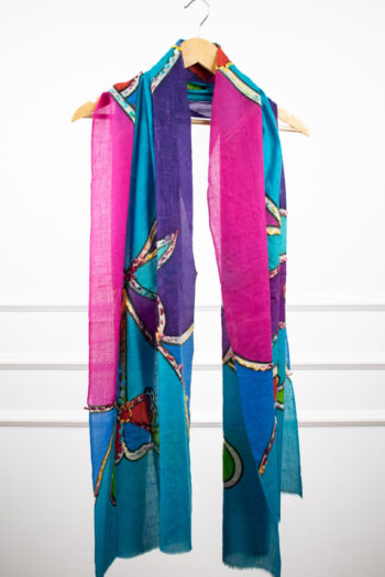 ThreadBloom Stole in sky background - a 100% wool floral print stole with painted and hand-embellished motifs
