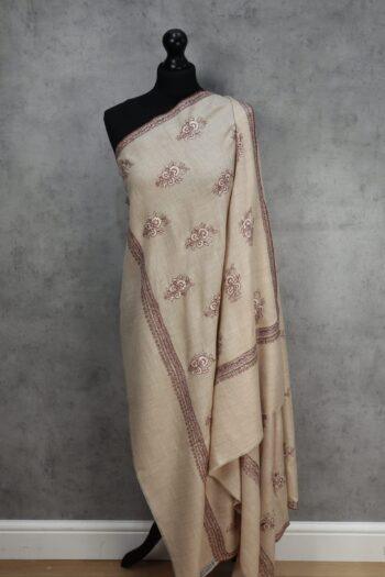 Gulnaaz Handmade Shawl, an Elegant Floral Pashmina Shawl Design in beige with blush embroidery, crafted with Sozni artistry