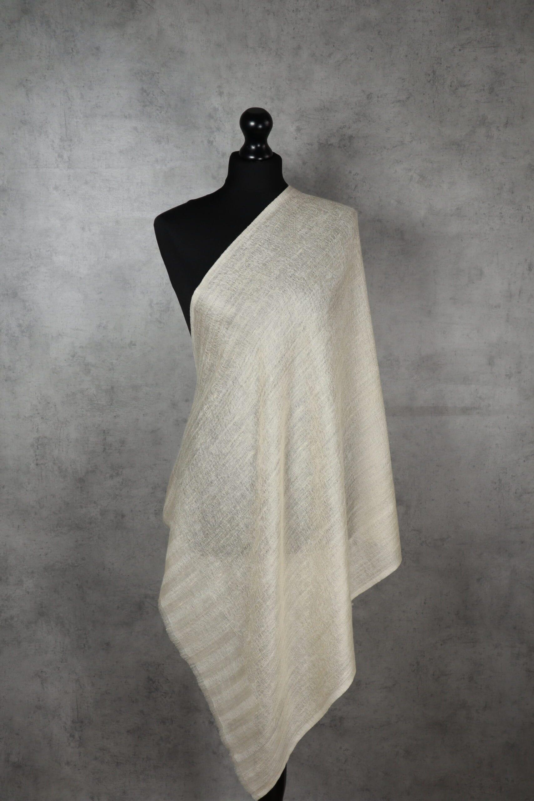 Jacquard Pashmina Stole in ivory, woven from Pashmina, featuring subtle jacquard patterns, offering elegance & perfect drape.