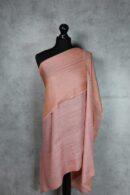 Moonlight Glow Shawl in Baby Pink, an elegant evening shawl woven with 85% wool and 15% silk, featuring golden threads for subtle luxury.