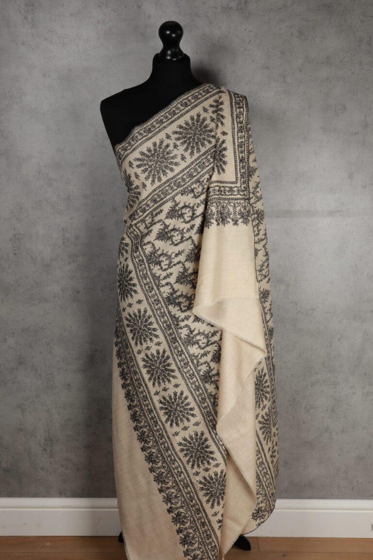 Shalimar Twilight Handmade Shawl, an embroidered pashmina with sozni hand-stitched snowflake motifs in ebony thread.