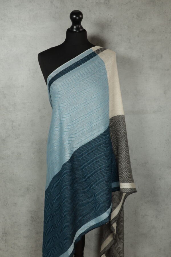 Harmony Weave Stole in Sky & Ivory, a herringbone stole with breathable warmth and flowing elegance.